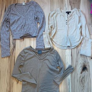 3 brown long sleeve tops